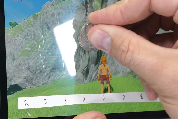Masih Dilapisi Plastik, Nintendo Switch Versi OLED Bisa Tergores oleh Uang Koin!