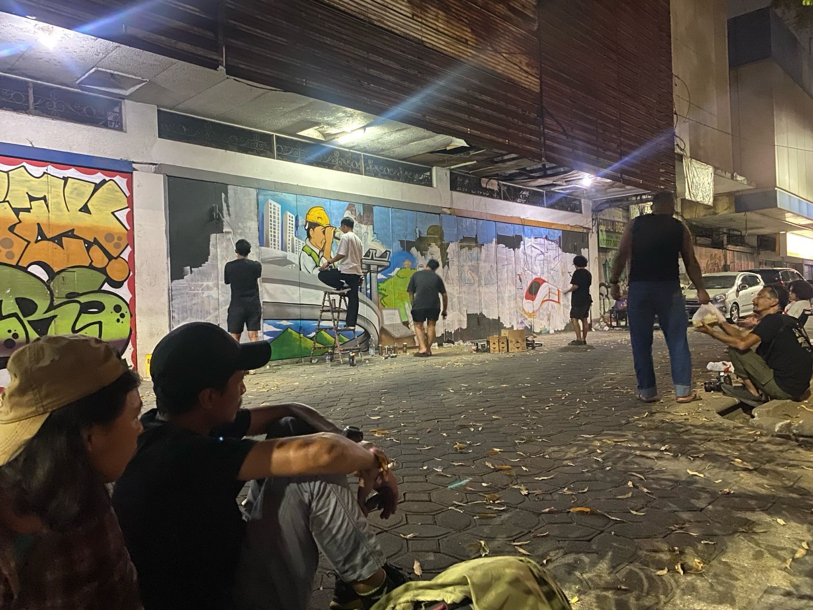 Melihat Karya Mural Anak Muda Solo Ikut Sambut Kepulangan Jokowi