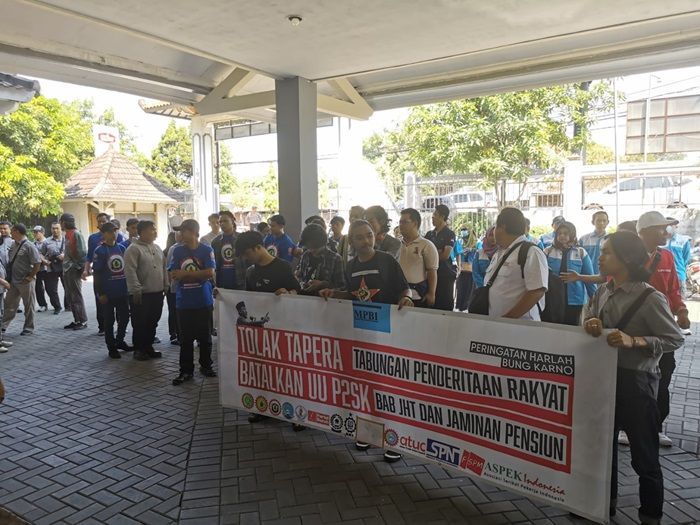 Gelar Aksi Damai, Buruh Jogja Desak Disnakertrans DIY Agar TAPERA Batal!